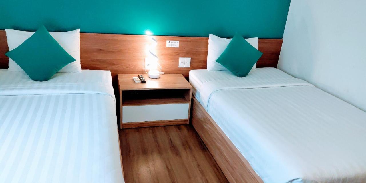 Sing Hotel Da Nang Bagian luar foto