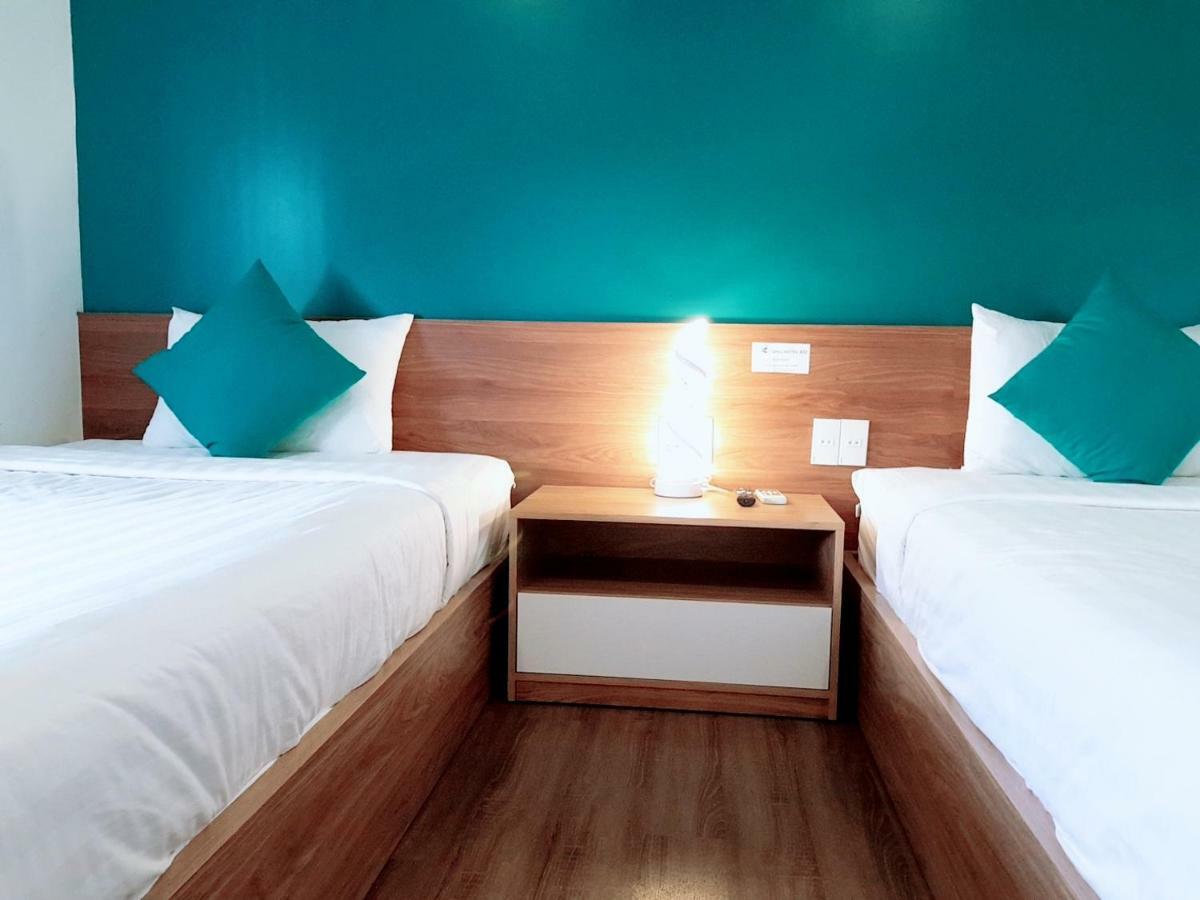 Sing Hotel Da Nang Bagian luar foto